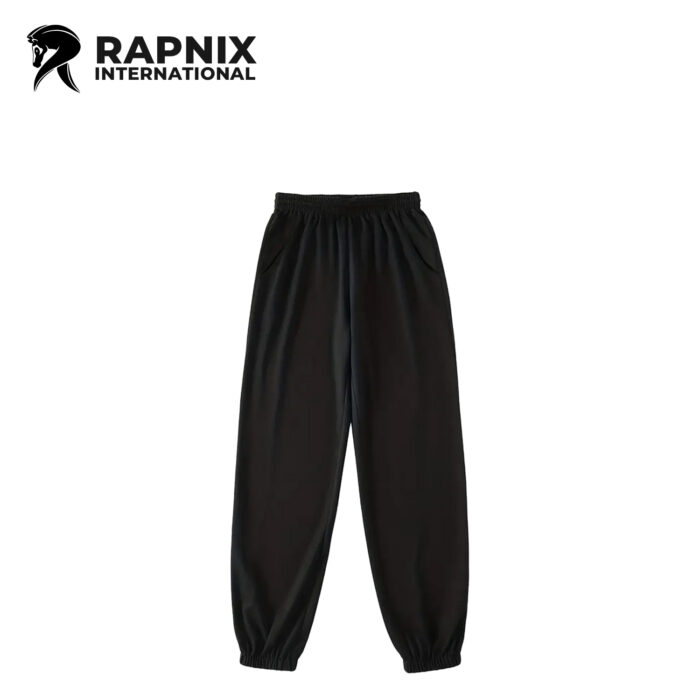 Black cotton fleece sweatpants with loose baggy fit and ribbed cuffs for winter warmth
